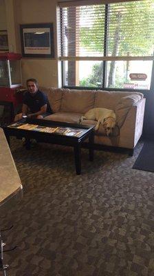 Garage door technician, Dave, and puppy mascot, Bella, taking a small lunch break during the day. :)