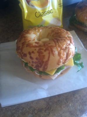 Bagel sandwiches with chips.