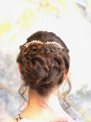 Every year there's a trend for prom hair. This year was the braids and loose curls. How beautiful?!?