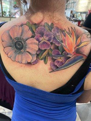 Anemone flower, violets, and bird of paradise tattoos