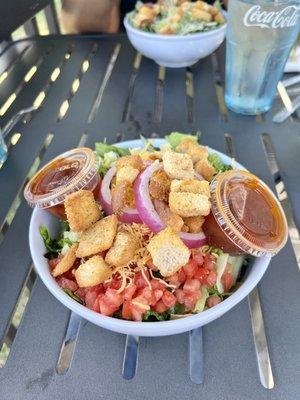 The red rooster salad with red rooster dressing.