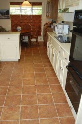 We have the largest selection of glass tile, stone and porcelain. Actual photo kitchen,12x12 tile with glass inserts.