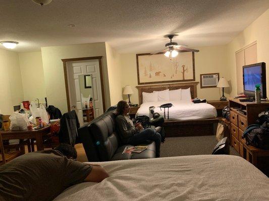 Very spacious room with 2 king beds, a futon and dining area.