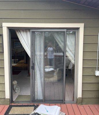 Replacement of patio door to aluminum bronze with bronze capping.