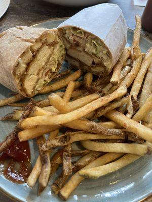 Honey Chicken Cutlet on a wheat wrap with fries.