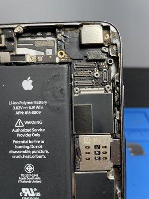 Damaged motherboard connector iPhone 6. Call us for a free quote.