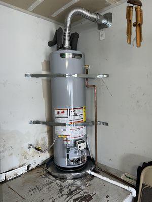 After picture:  Water heater installation out with the Old, in with the New