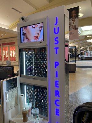 Just pierce it at Green Acres Mall (across from express and  bath and body works)