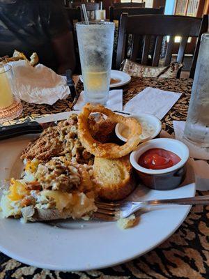 Fried catfish topped with spicy crayfish and shrimp. Loaded baked potato. The tarter sauce is good. $23