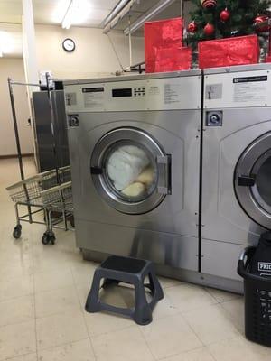 Industrial washer, soap loads on top and if you're under 5'5" borrow their step stool. You won't be able to reach it!