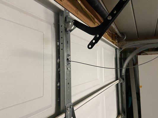 Garage door spring replacement and vault lock installed on a detached garage in Mesa AZ.