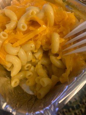 Dry noodles with hard cheese on top