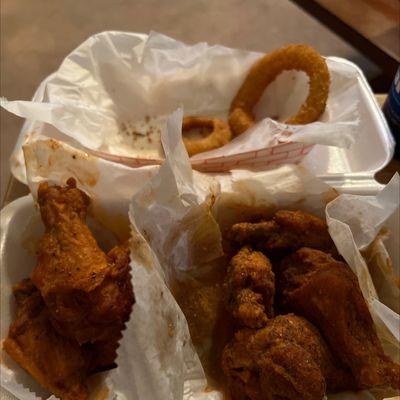 Onion rings, hot buffalo sauce on the left, Mike spicy rub on the right, all exceptional!