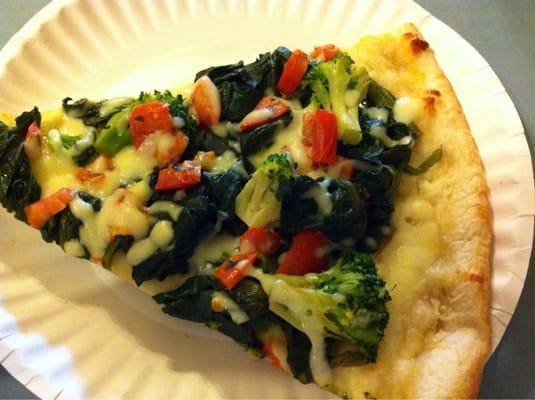 Veggie pizza with spinach, tomato, and broccoli. Yum!