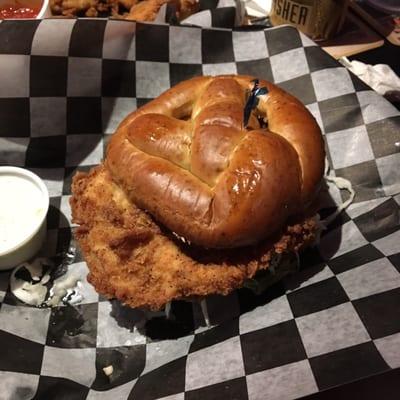 Rocks Chicken Sandwich on a pretzel bun with cilantro mayo