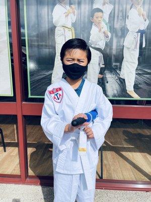 White belt, first stripe