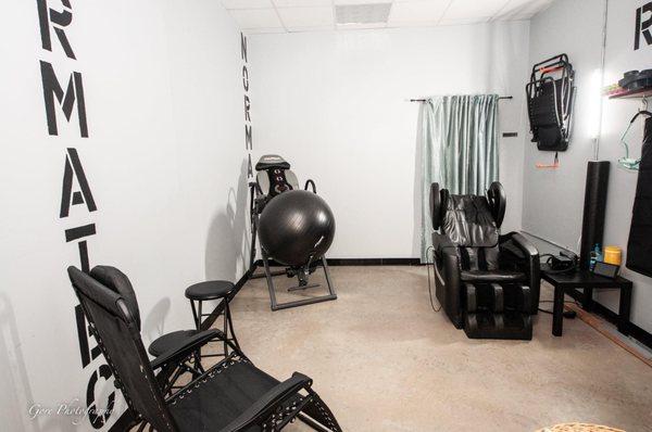 recovery area for normatec compression, shiatsu chair massage, inversion table, stretching space