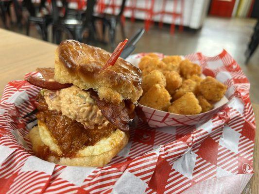 Breakfast biscuit. Pimento cheese, bacon, egg and medium spice. Add some tater tots for fun!