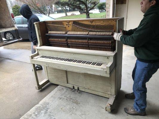 Moving a piano on a rainy Wednesday!