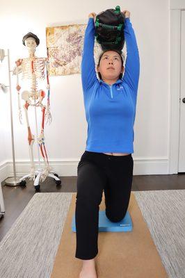 Corrective exercise helps client improve shoulder mobility through better core stability.