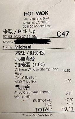 The receipt from Hot Wok. They charged me a $1 extra to put egg in my Shrimp fried rice.