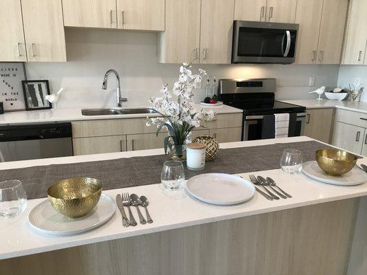 The kitchen & island of the apartment