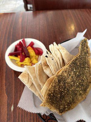 Complementary Pita bread, zaatar bread and pickled veggies