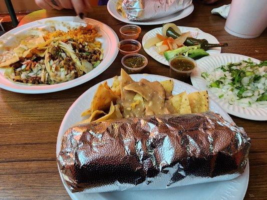 Burrito and al pastor taco plate with alllll the delicious fixins