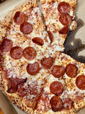 Pizza with pepperoni and cheese