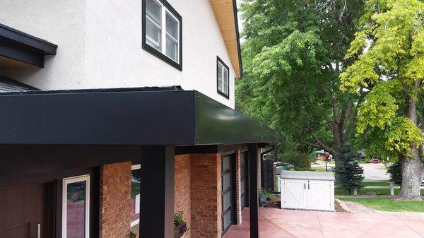 Custom 12" Box Gutter With a 4x4 Box Downspout. Also a metal-wrapped fascia and posts.