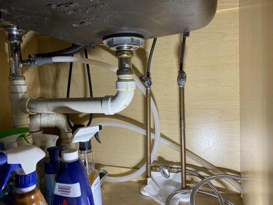 drain line runs from dishwasher to sink drain, bypassing air gap.