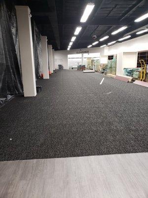 New commercial carpet and LVT in a Mall shoe store.