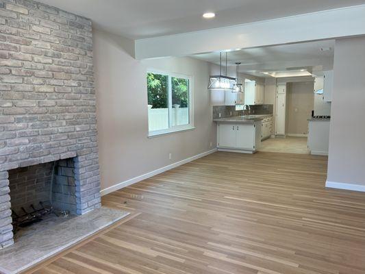 Refinished hardwood flooring throughout home