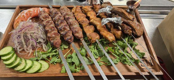 Kebabs on platter Lulya kebab, Chicken kebab, Lamb kebab, beef kebab and lamb chops kebab