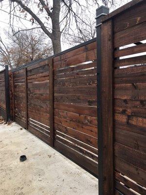 Costume fence with sliding gate.