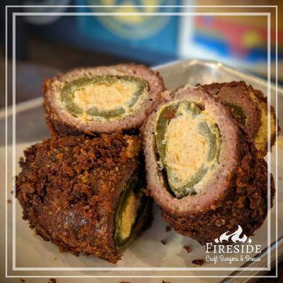 Armadillo Eggs - jalapeno stuffed with kickin' cream cheese, wrapped in sausage and smoked, then breaded and fried