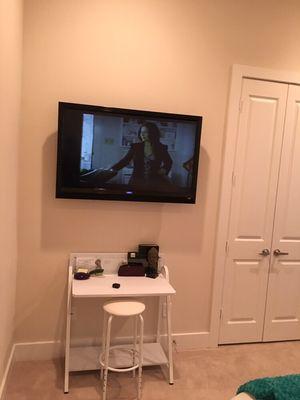 Wall mounted TV with concealed cables