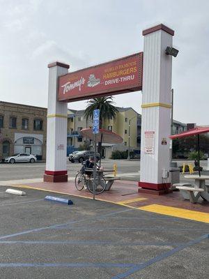 Street sign and tables in front of