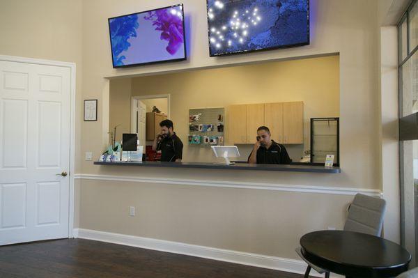 Juan and Anthony at Reception Desk