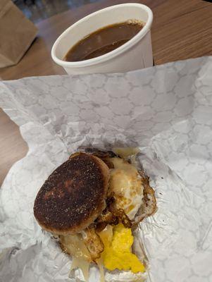 One of their 2 breakfast sandwiches, and the coffee is strong and hot.