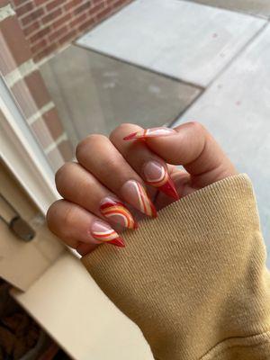 Nail design by Kenny G, inspired by the 70s.