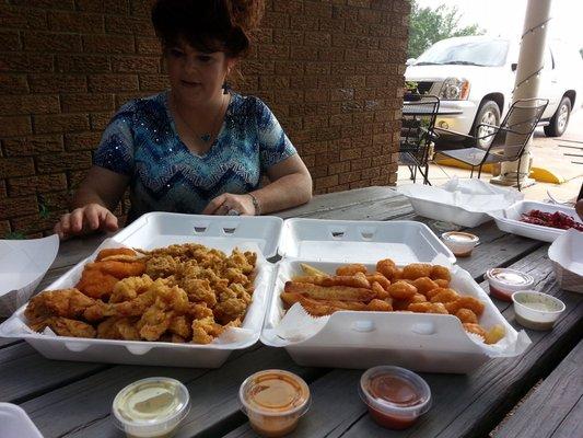 The proprietress, Miz Mandy, and her seafood platter