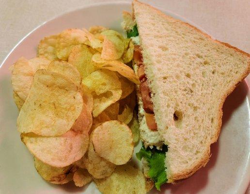 Chicken salad half sandwich and chips