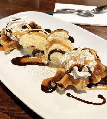 Waffles with ice cream and caramel/chocolate drizzle