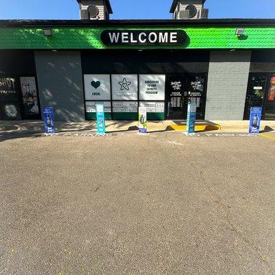 This is the exterior back entrance  of House Of Vapes Smoke Shop in Riverton.