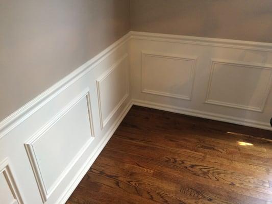 Wainscoting installed and painted in a semi-gloss white. Walls above wainscoting were painted as well.