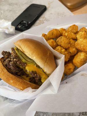 My buddy liked his burger and the tots are fire With the ranch