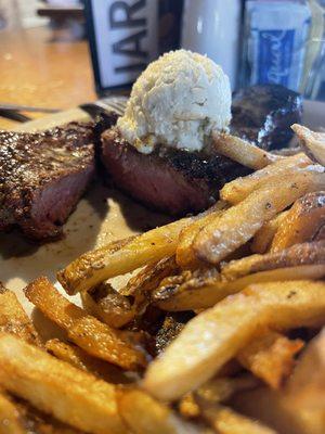 10 oz Sirloin topped cooked Medium w/Blue cheese butter and served with Homemade French Fries