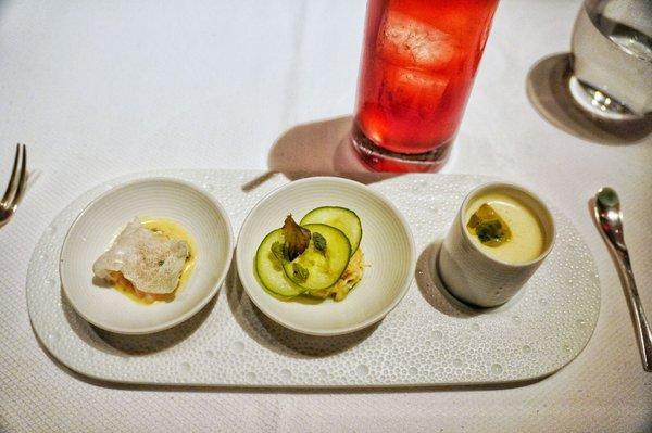 Amuse bouche of Black bass ceviche and crab salad and gazpacho