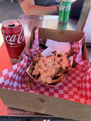 Smashed fries and a coke.